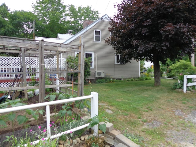 27 Grove St, Sanford, ME 04083 - view of grassy yard with a vegetable garden