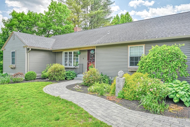 4 Mayflower Rd, Hallowell, ME 04347 - view of front of house with a chimney, a front lawn, and roof with shingles