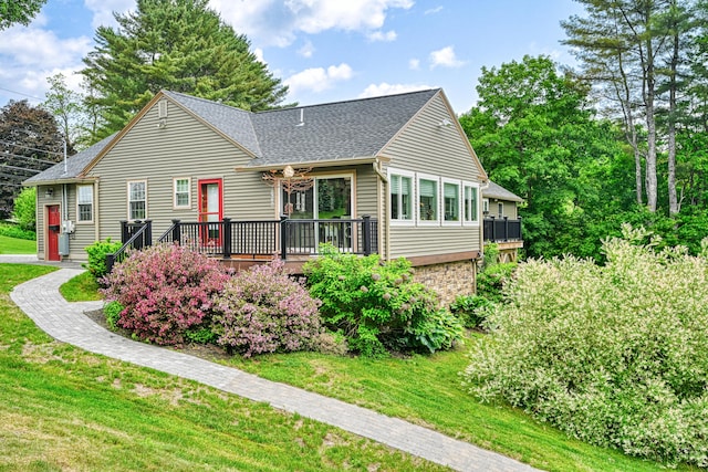 4 Mayflower Rd, Hallowell, ME 04347 - rear view of property with a wooden deck, a yard, and roof with shingles