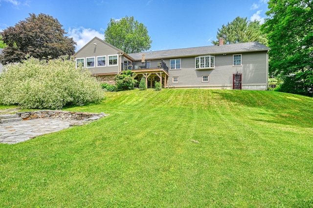 4 Mayflower Rd, Hallowell, ME 04347 - rear view of house featuring a chimney, a deck, and a yard