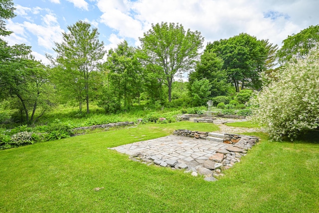 4 Mayflower Rd, Hallowell, ME 04347 - view of grassy yard featuring a patio area