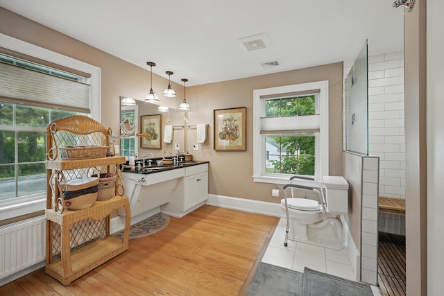 4 Mayflower Rd, Hallowell, ME 04347 - full bath with plenty of natural light, vanity, and a tile shower