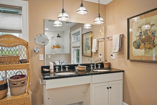 4 Mayflower Rd, Hallowell, ME 04347 - bathroom featuring double vanity and a shower
