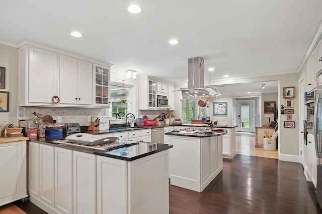 4 Mayflower Rd, Hallowell, ME 04347 - kitchen featuring a peninsula, island exhaust hood, dark wood-style flooring, dark countertops, and recessed lighting
