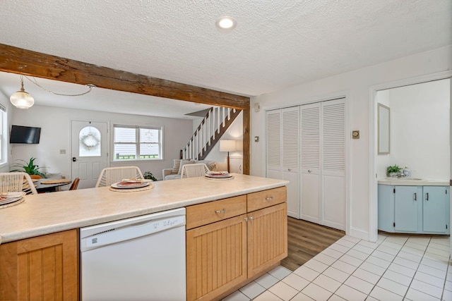 3 Ocean Breeze Unit 2, York, ME 03909 - kitchen with white dishwasher, light tile patterned floors, a textured ceiling, and light countertops