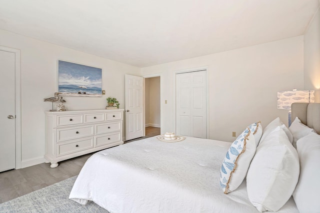 3 Ocean Breeze Unit 2, York, ME 03909 - bedroom with wood finished floors, baseboards, and a closet