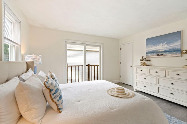 3 Ocean Breeze Unit 2, York, ME 03909 - bedroom featuring multiple windows, access to outside, wood finished floors, and baseboards