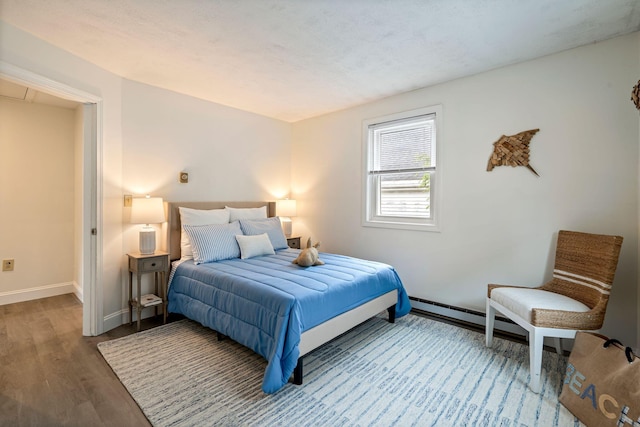 3 Ocean Breeze Unit 2, York, ME 03909 - bedroom featuring wood finished floors and baseboards