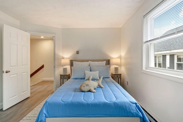 3 Ocean Breeze Unit 2, York, ME 03909 - bedroom featuring wood finished floors and baseboards