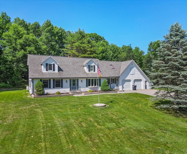 426 Fuller Rd, Carmel, ME 04419 - cape cod home featuring a garage, a front lawn, concrete driveway, and a shingled roof