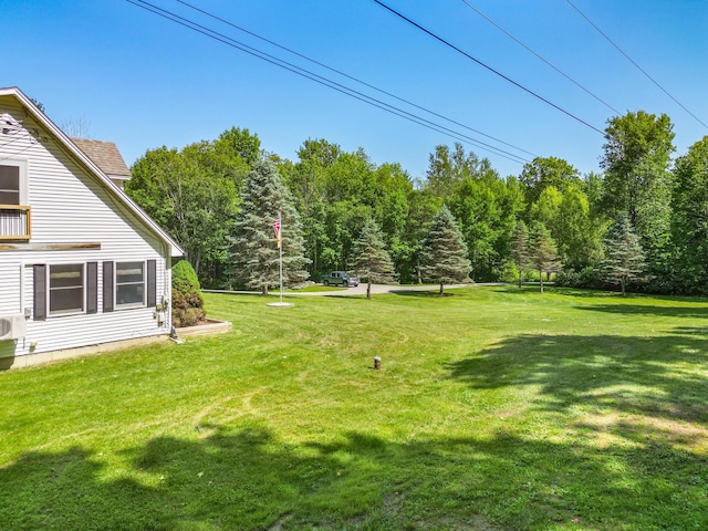 426 Fuller Rd, Carmel, ME 04419 - view of grassy yard featuring a wooded view
