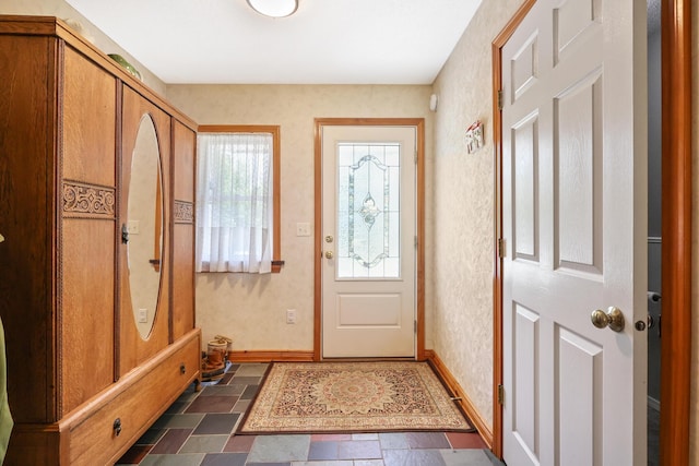 426 Fuller Rd, Carmel, ME 04419 - foyer with plenty of natural light and stone tile floors