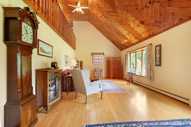 426 Fuller Rd, Carmel, ME 04419 - living area featuring baseboard heating, ceiling fan, wood ceiling, wood finished floors, and high vaulted ceiling