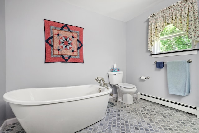426 Fuller Rd, Carmel, ME 04419 - bathroom with a baseboard heating unit and a freestanding tub