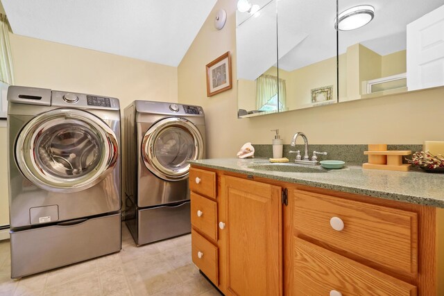 426 Fuller Rd, Carmel, ME 04419 - laundry room with independent washer and dryer, cabinet space, and light tile patterned floors