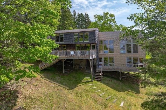 47 Eaton Point Rd, Deer Isle, ME 04627 - rear view of property featuring stairs, a deck, and a yard