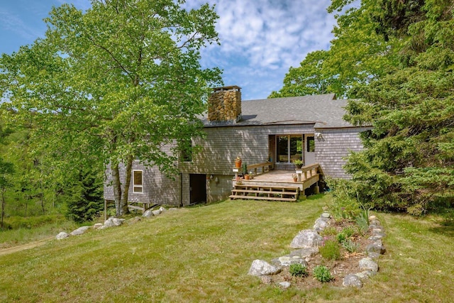 47 Eaton Point Rd, Deer Isle, ME 04627 - rear view of house with a lawn, a deck, and a chimney