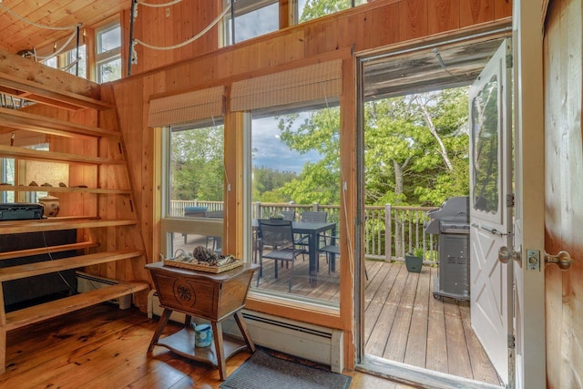 47 Eaton Point Rd, Deer Isle, ME 04627 - entryway with wood-type flooring and wooden walls