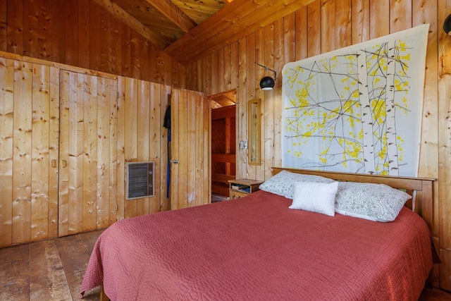 47 Eaton Point Rd, Deer Isle, ME 04627 - bedroom featuring heating unit, vaulted ceiling, wooden walls, and wooden ceiling
