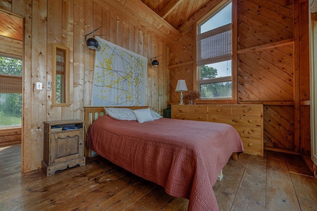47 Eaton Point Rd, Deer Isle, ME 04627 - bedroom featuring wood walls, hardwood / wood-style flooring, multiple windows, and lofted ceiling