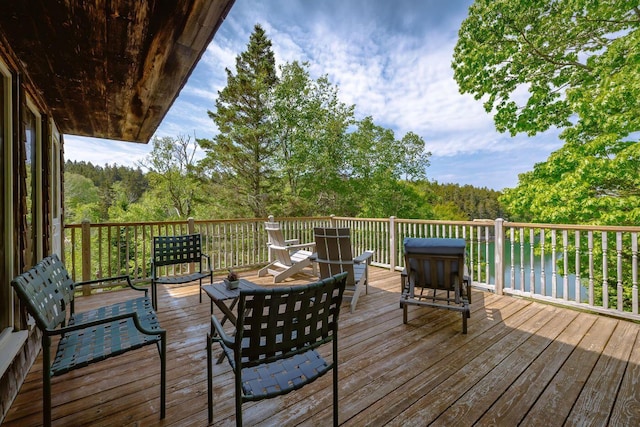 47 Eaton Point Rd, Deer Isle, ME 04627 - deck featuring a forest view