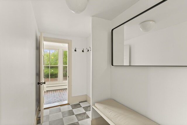 565 Bagaduce Rd, Brooksville, ME 04617 - mudroom with baseboard heating and baseboards