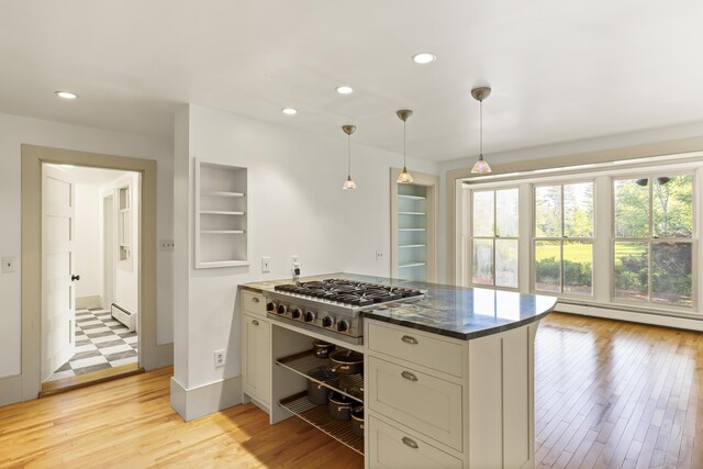 565 Bagaduce Rd, Brooksville, ME 04617 - kitchen featuring stainless steel gas stovetop, a baseboard heating unit, recessed lighting, light wood-style floors, and decorative light fixtures