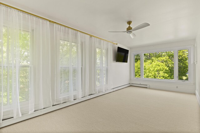 565 Bagaduce Rd, Brooksville, ME 04617 - unfurnished sunroom featuring a baseboard radiator