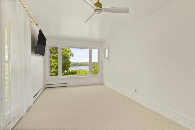 565 Bagaduce Rd, Brooksville, ME 04617 - carpeted empty room with a ceiling fan and baseboards