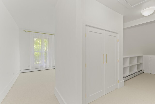565 Bagaduce Rd, Brooksville, ME 04617 - hall with a baseboard radiator and carpet