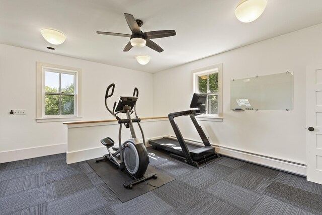 565 Bagaduce Rd, Brooksville, ME 04617 - exercise room featuring dark colored carpet, a ceiling fan, and baseboards