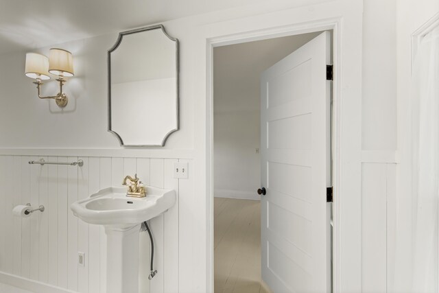 565 Bagaduce Rd, Brooksville, ME 04617 - bathroom with a wainscoted wall and a sink