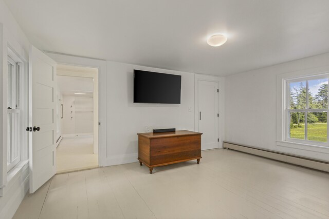 565 Bagaduce Rd, Brooksville, ME 04617 - bedroom featuring a baseboard heating unit