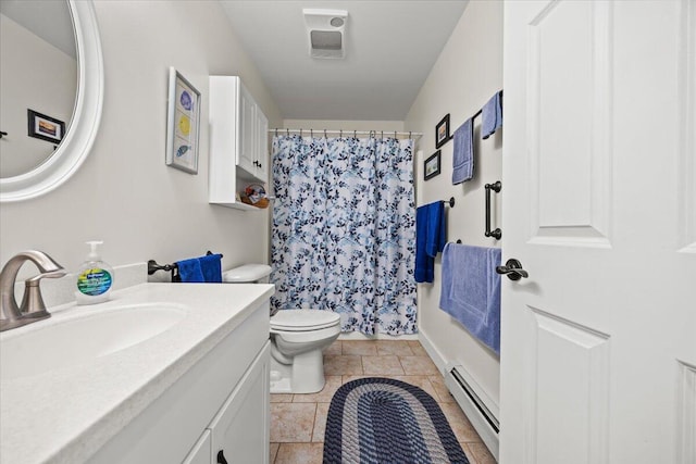 489 Shady Nook Rd, Newfield, ME 04095 - bathroom featuring baseboard heating, vanity, and curtained shower