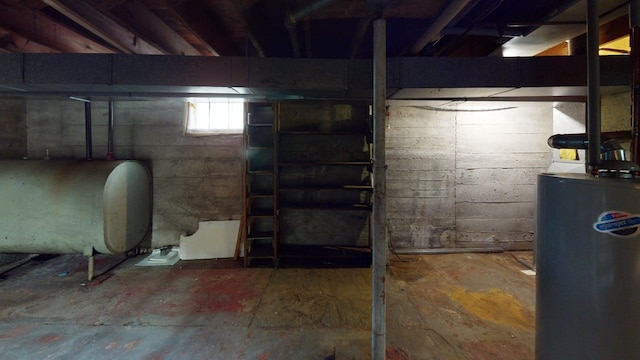 180 Bowdoin St, Millinocket, ME 04462 - basement featuring oil tank and water heater