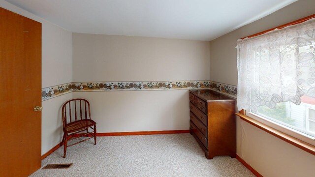 180 Bowdoin St, Millinocket, ME 04462 - unfurnished room featuring light carpet