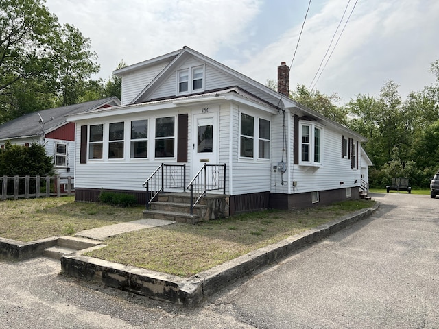 180 Bowdoin St, Millinocket, ME 04462 - view of front facade with a chimney