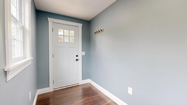 422 Centre St, Bath, ME 04530 - doorway to outside featuring baseboards and dark wood-type flooring