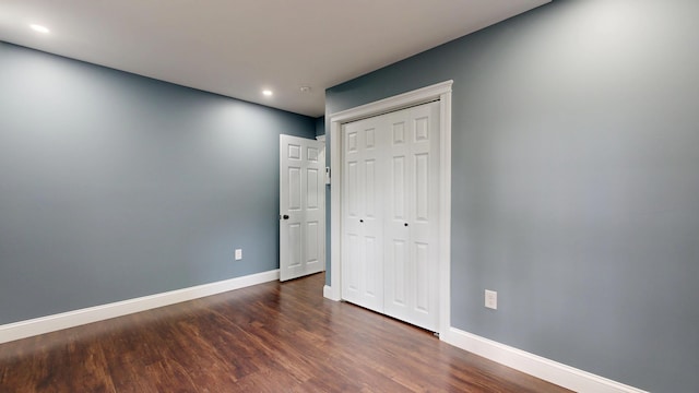 422 Centre St, Bath, ME 04530 - unfurnished bedroom featuring dark wood-style flooring, a closet, and recessed lighting