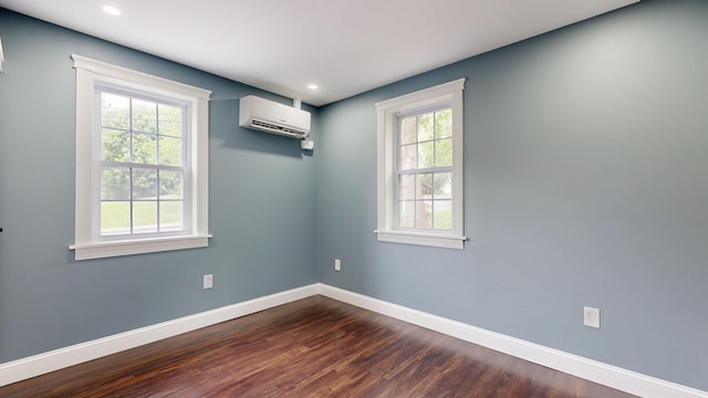 422 Centre St, Bath, ME 04530 - unfurnished room featuring a wall mounted AC, dark wood-style floors, and recessed lighting