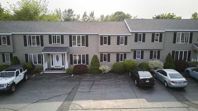 1372 Post Rd Unit 3A, Wells, ME 04090 - view of front of property featuring uncovered parking and roof with shingles