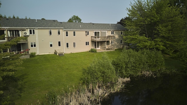 1372 Post Rd Unit 3A, Wells, ME 04090 - back of house featuring a yard and a wooden deck