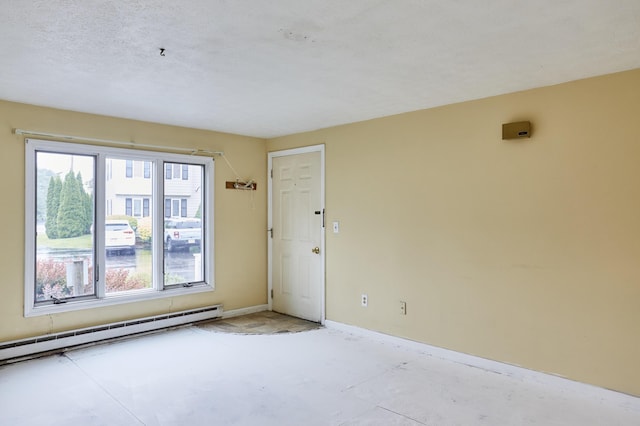 1372 Post Rd Unit 3A, Wells, ME 04090 - unfurnished room featuring a baseboard radiator and baseboards