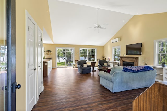 189 Basin Point Rd, Harpswell, ME 04079 - living room featuring a wall mounted air conditioner, dark wood-style flooring, a ceiling fan, high vaulted ceiling, and healthy amount of natural light