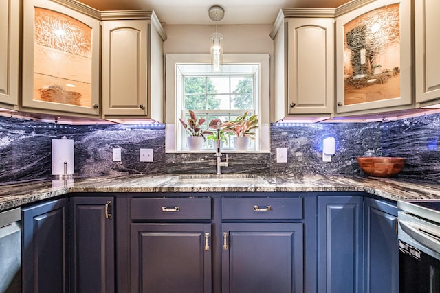 29 Harding St, Biddeford, ME 04005 - kitchen featuring a sink, dark countertops, backsplash, and glass insert cabinets