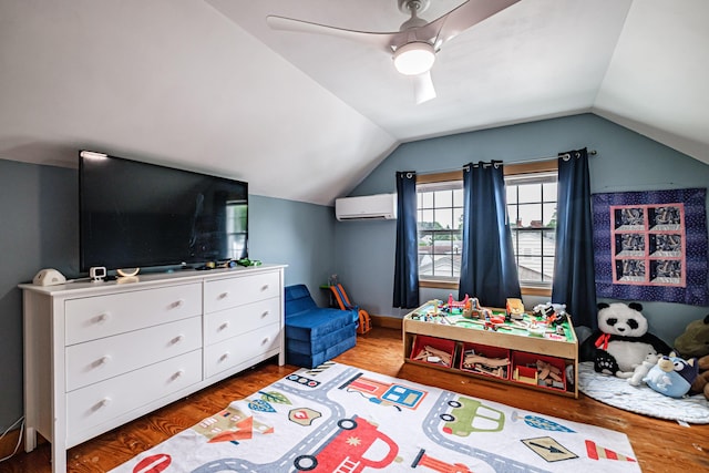 29 Harding St, Biddeford, ME 04005 - bedroom featuring a wall mounted air conditioner, wood finished floors, lofted ceiling, and a ceiling fan