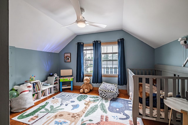 29 Harding St, Biddeford, ME 04005 - bedroom featuring wood finished floors, lofted ceiling, a ceiling fan, and a nursery area