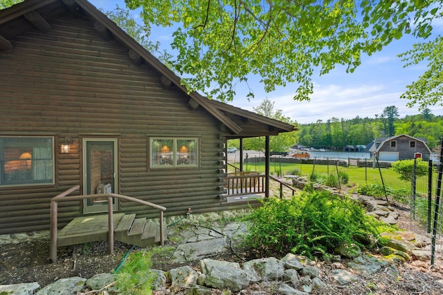 41 Canal St, Grand Lake Stream Plt, ME 04668 - view of property exterior with log siding