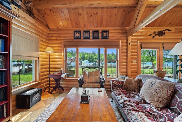 41 Canal St, Grand Lake Stream Plt, ME 04668 - living room with hardwood / wood-style floors, log walls, healthy amount of natural light, wooden ceiling, and french doors