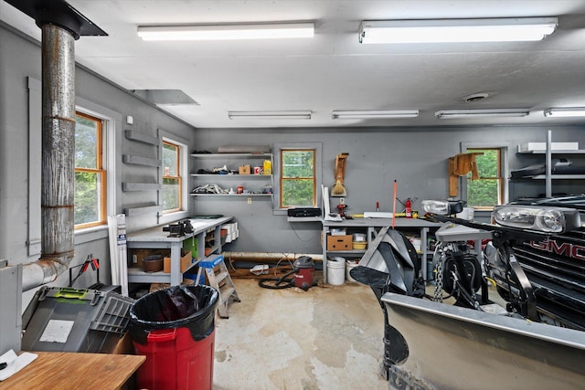 41 Canal St, Grand Lake Stream Plt, ME 04668 - miscellaneous room with unfinished concrete flooring and a workshop area